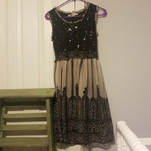 Knee length black and cream dress